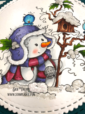 Miss Frosty snowman has a few bird friends.
