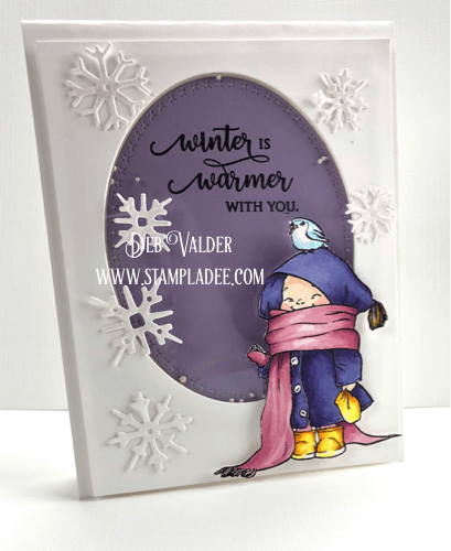 Bundles little person feeding a bird on a snowy day in a shaker card