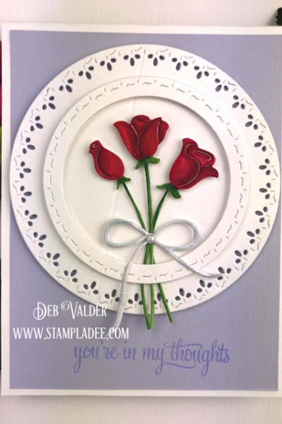 Red Roses are paired with Stitched square and circles for a beautiful card
