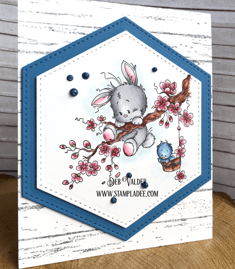 This whimsical Springtime Bunny is hanging around.
